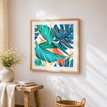 Tropical monstera leaves pattern cross stitch artwork displayed on wall as home decor