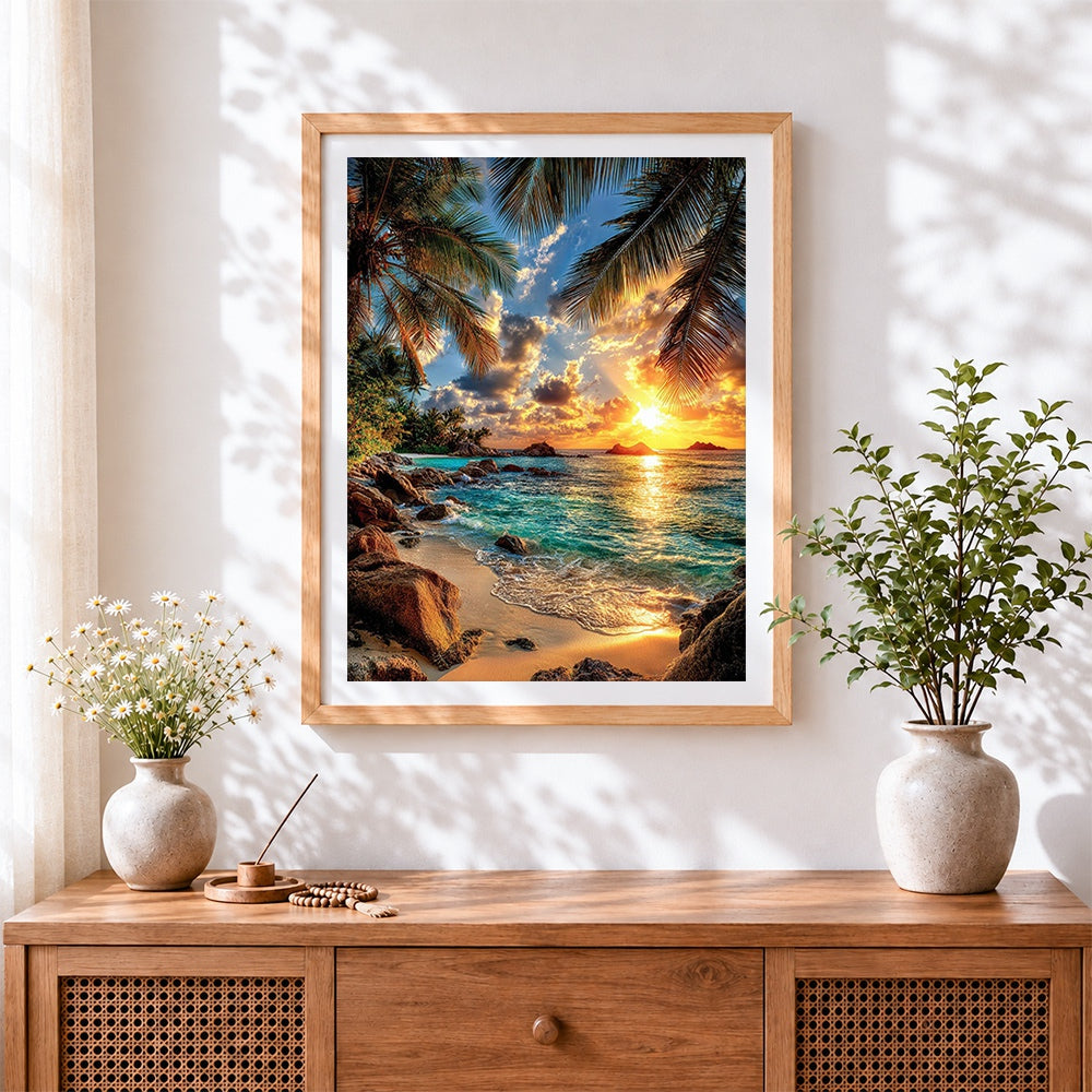 Finished tropical sunset through palm leaves cross stitch artwork displayed
