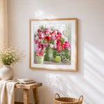 Tulips in a green jug cross stitch artwork displayed on wall as home decor