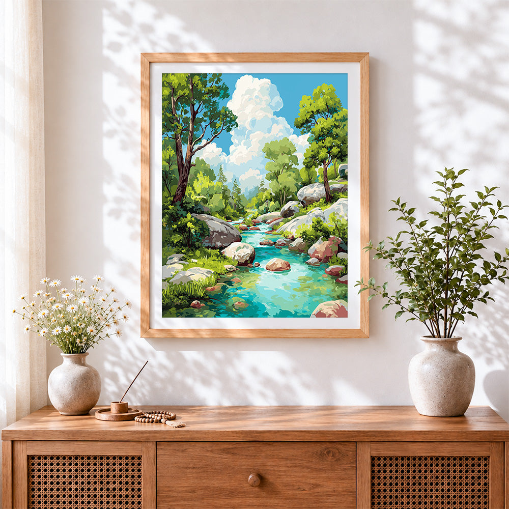 Finished turquoise mountain stream and rocks cross stitch artwork displayed