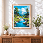 Finished turquoise mountain stream cross stitch artwork displayed