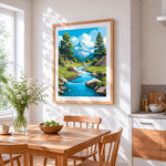 Turquoise mountain stream cross stitch artwork displayed on wall as home decor