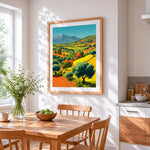 Tuscan rolling hills and olive trees cross stitch artwork displayed on wall as home decor
