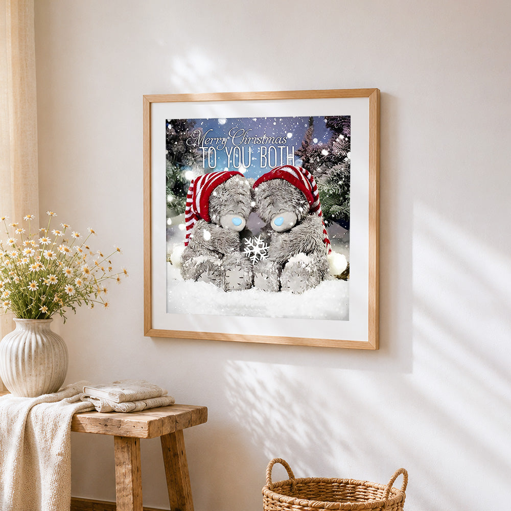 Two bears "merry christmas to you both" cross stitch artwork displayed on wall as home decor