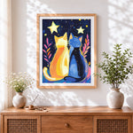 Finished two cats under the stars cross stitch artwork displayed