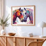 Two colourful horses in love cross stitch artwork displayed on wall as home decor
