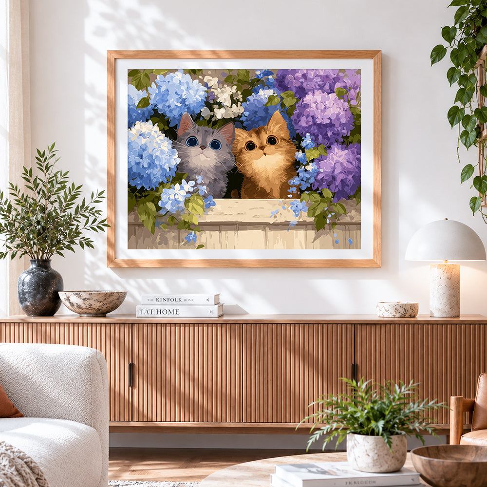 Finished two cute kittens in blue hydrangeas cross stitch artwork displayed
