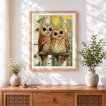 Finished two cute owls on birch branch cross stitch artwork displayed