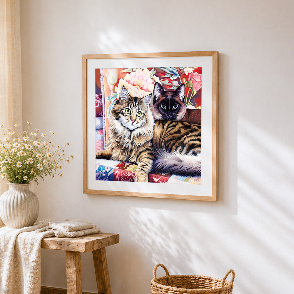 Two fluffy cats portrait cross stitch artwork displayed on wall as home decor