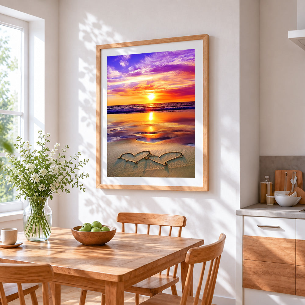 Two hearts on the beach cross stitch artwork displayed on wall as home decor