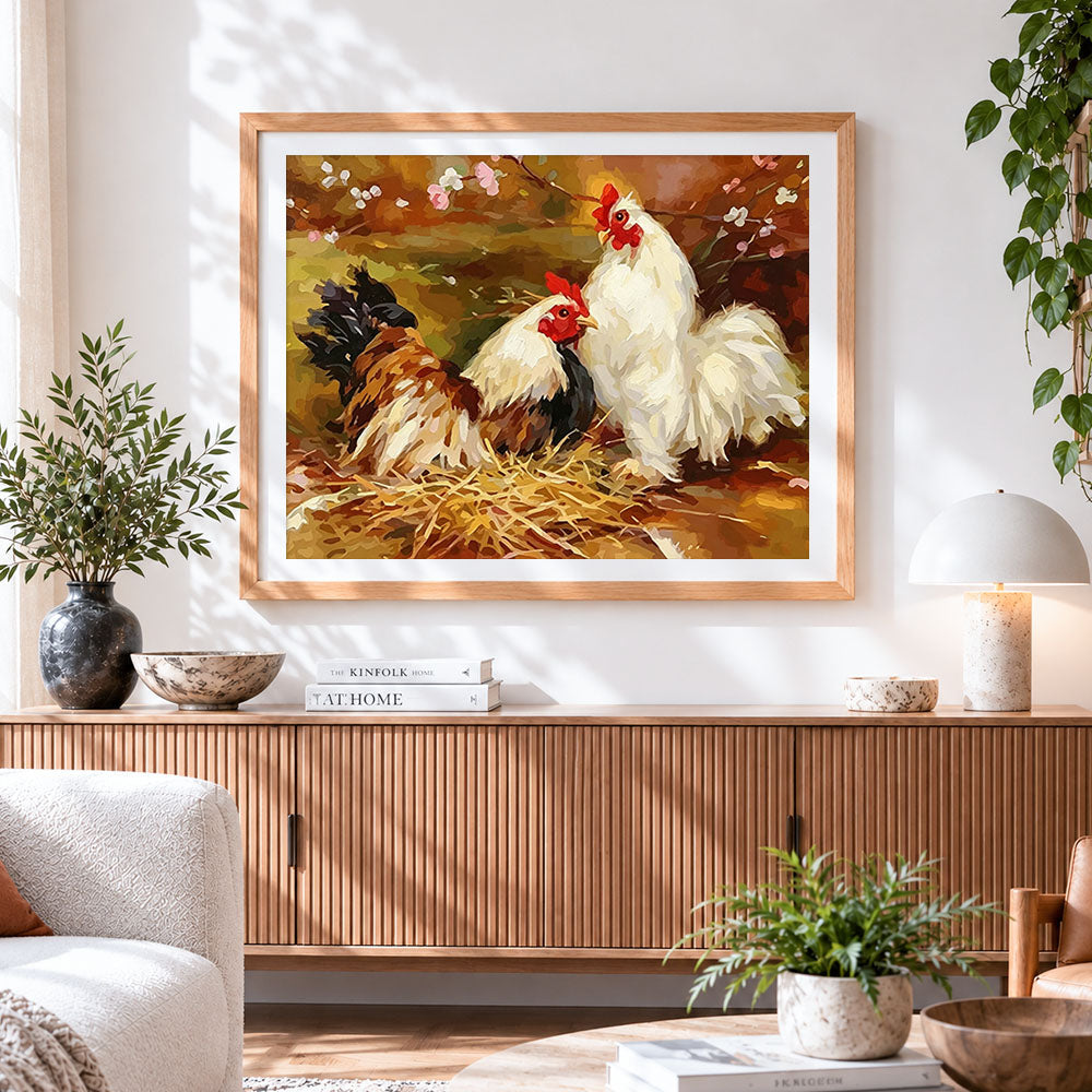 Finished two hens on a straw nest cross stitch artwork displayed