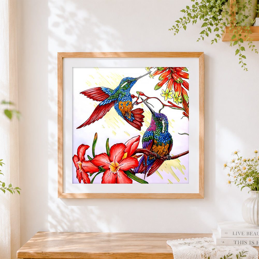 Finished two hummingbirds and red flowers cross stitch artwork displayed