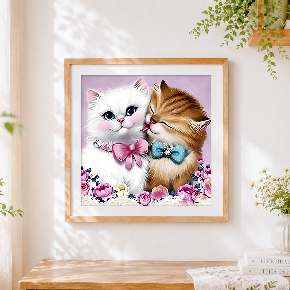Finished two kittens kissing cross stitch artwork displayed