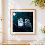 Finished two owls under the moon cross stitch artwork displayed