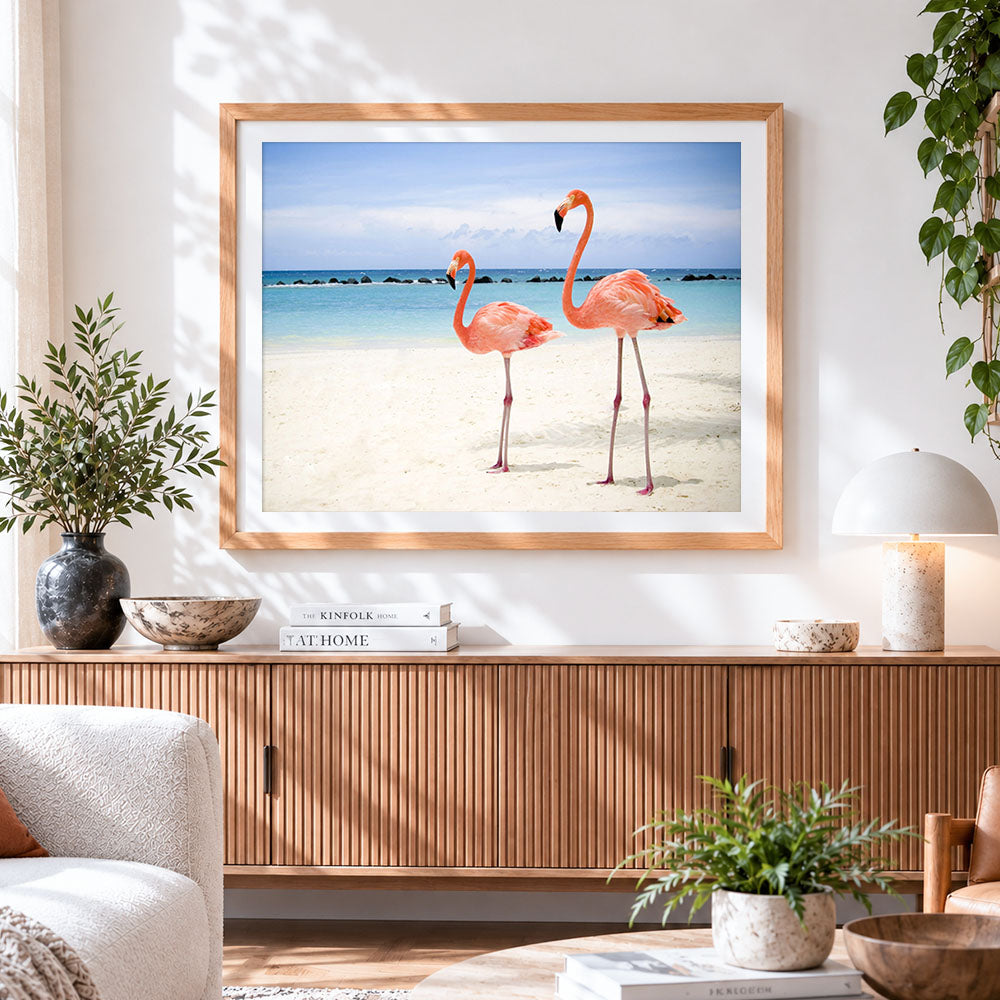 Finished two pink flamingos on tropical beach cross stitch artwork displayed