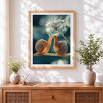 Finished two snails and a dandelion cross stitch artwork displayed