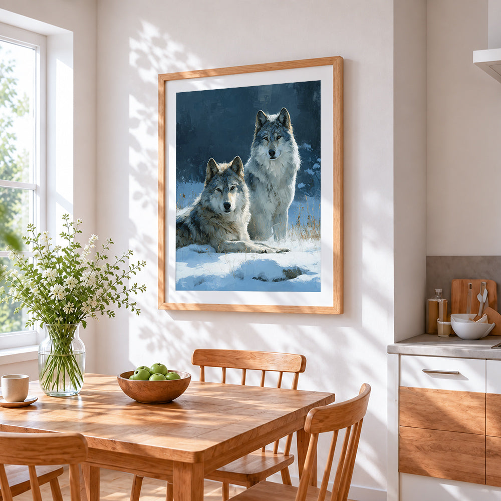 Two wolves in snow cross stitch artwork displayed on wall as home decor