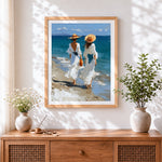 Finished two women in white dresses at the beach cross stitch artwork displayed
