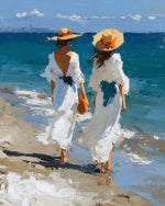 Two women in white dresses at the beach cross stitch kit for beginners