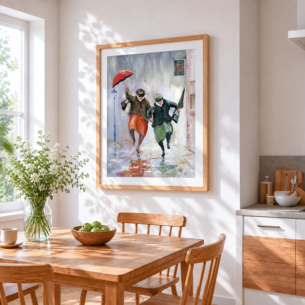 Two women running in the rain cross stitch artwork displayed on wall as home decor