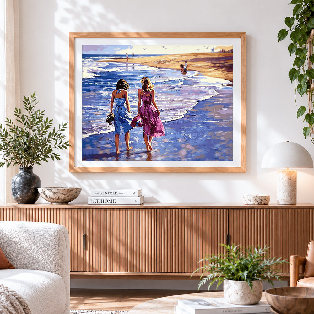 Finished two women walking on the beach cross stitch artwork displayed