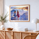 Two women walking on the beach cross stitch artwork displayed on wall as home decor
