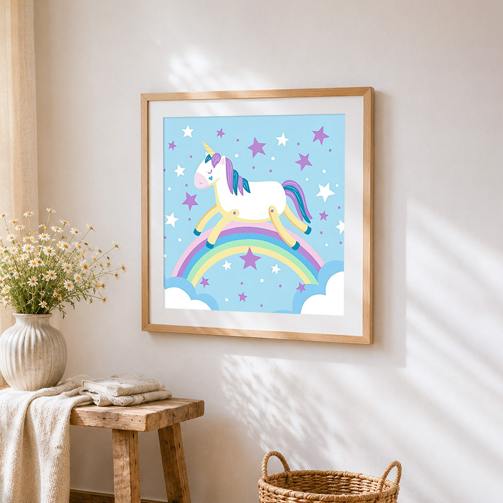 Unicorn balancing on a rainbow cross stitch artwork displayed on wall as home decor