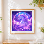 Finished unicorn in a starry bubble cross stitch artwork displayed