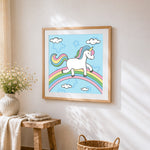 Unicorn walking on a rainbow cross stitch artwork displayed on wall as home decor