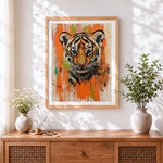 Finished urban graffiti tiger cross stitch artwork displayed