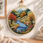 Valley river autumn scenery embroidery hoop wall art displayed as warm and cozy handmade home decor