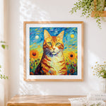 Finished van gogh inspired ginger cat cross stitch artwork displayed