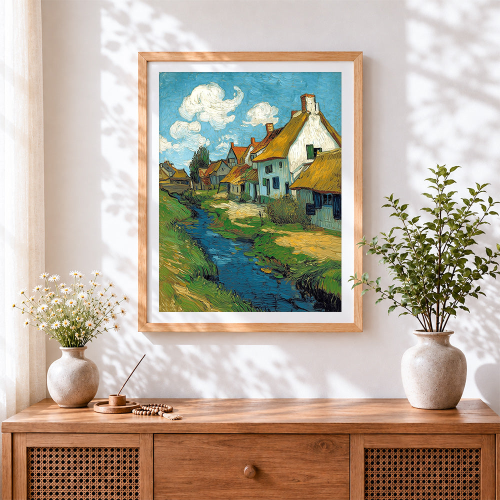 Finished van gogh inspired village and stream cross stitch artwork displayed