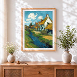Finished van gogh inspired village and stream cross stitch artwork displayed