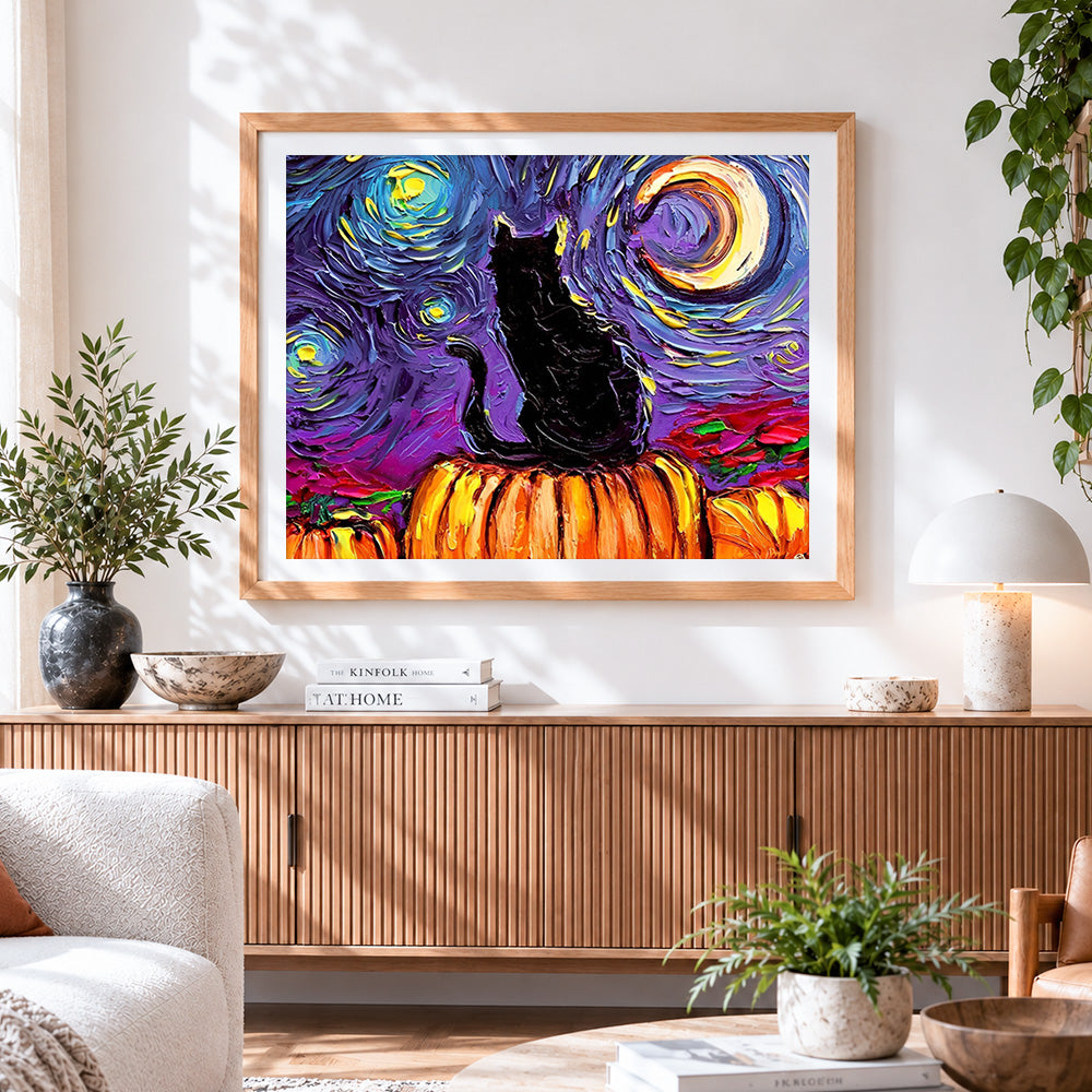 Finished van gogh style black cat and pumpkins cross stitch artwork displayed