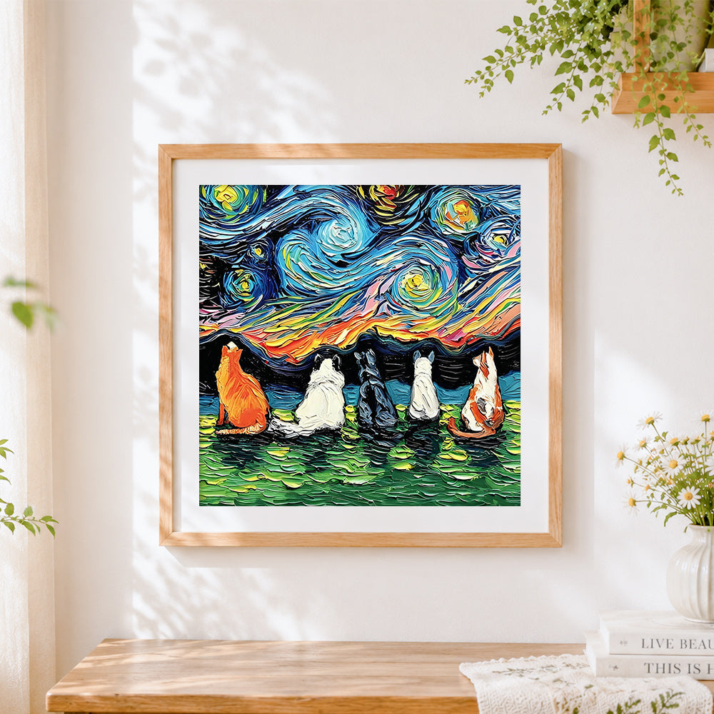 Finished van gogh style cats watching starry night cross stitch artwork displayed