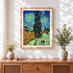 Finished van gogh style cypress trees cross stitch artwork displayed