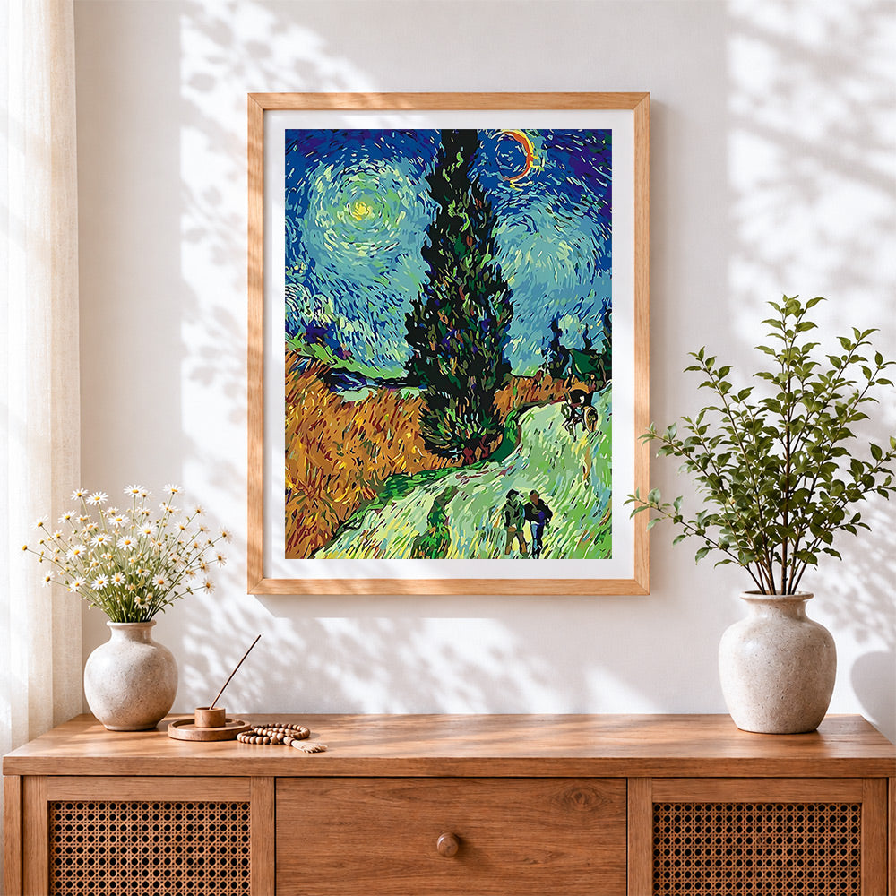 Finished van gogh style cypress trees cross stitch artwork displayed
