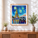 Finished van gogh style eiffel tower cross stitch artwork displayed