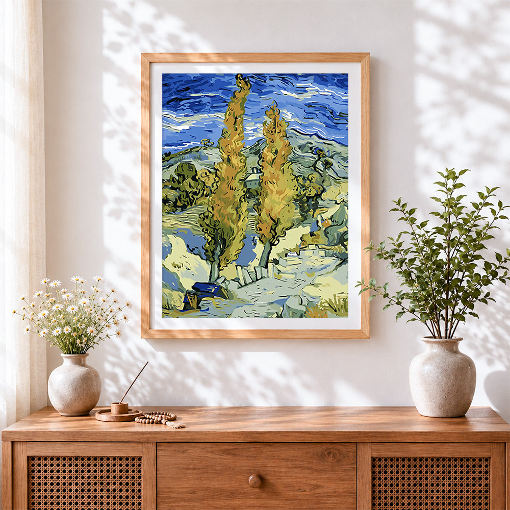 Finished van gogh style landscape cross stitch artwork displayed
