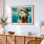 Van gogh style snowman cross stitch artwork displayed on wall as home decor