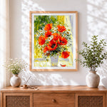 Finished vase of red poppies and daisies cross stitch artwork displayed
