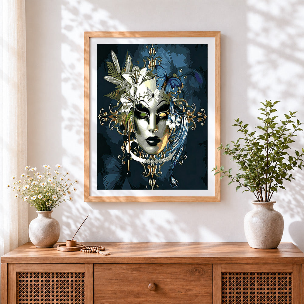 Finished venetian masquerade mask portrait cross stitch artwork displayed