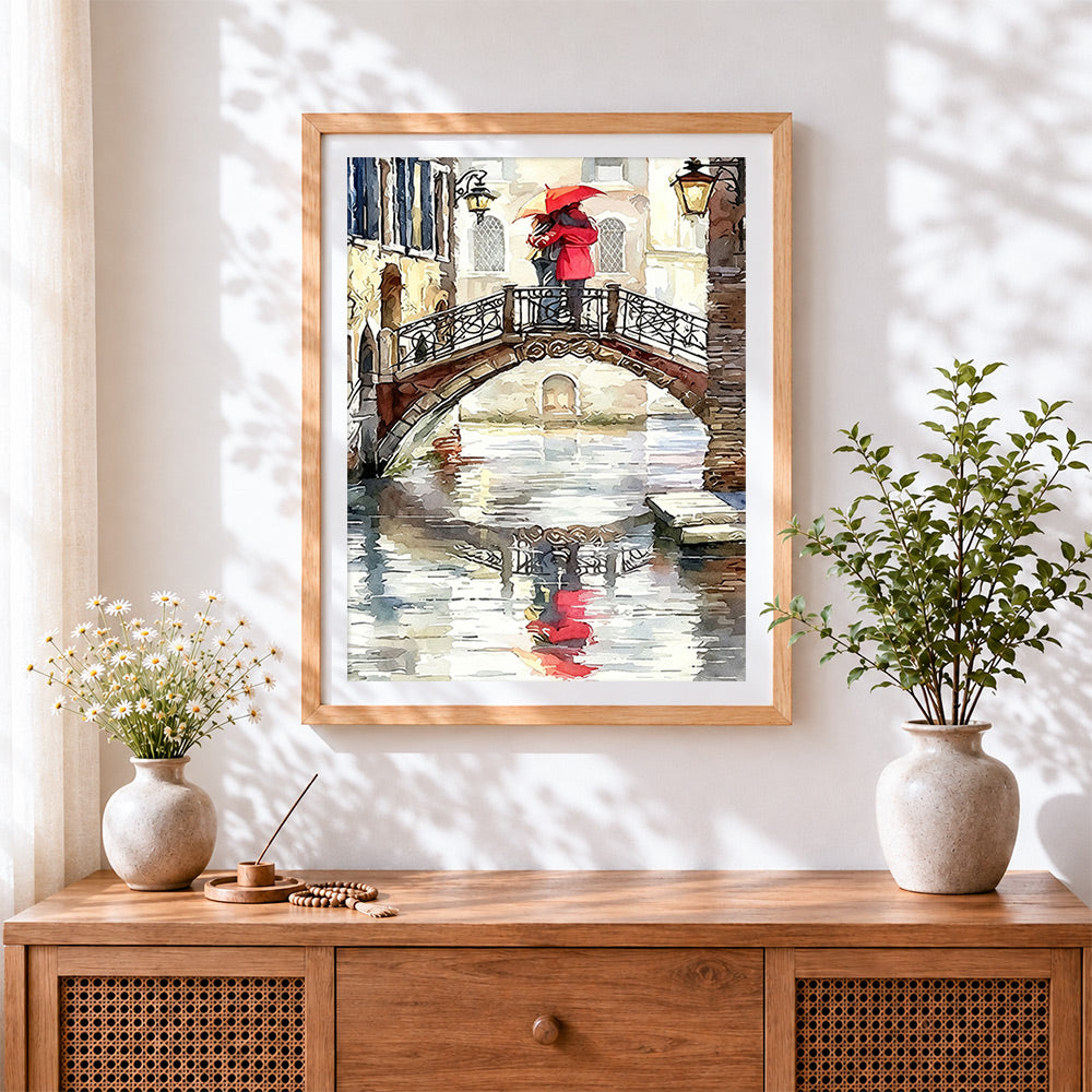 Finished venice bridge and couple cross stitch artwork displayed