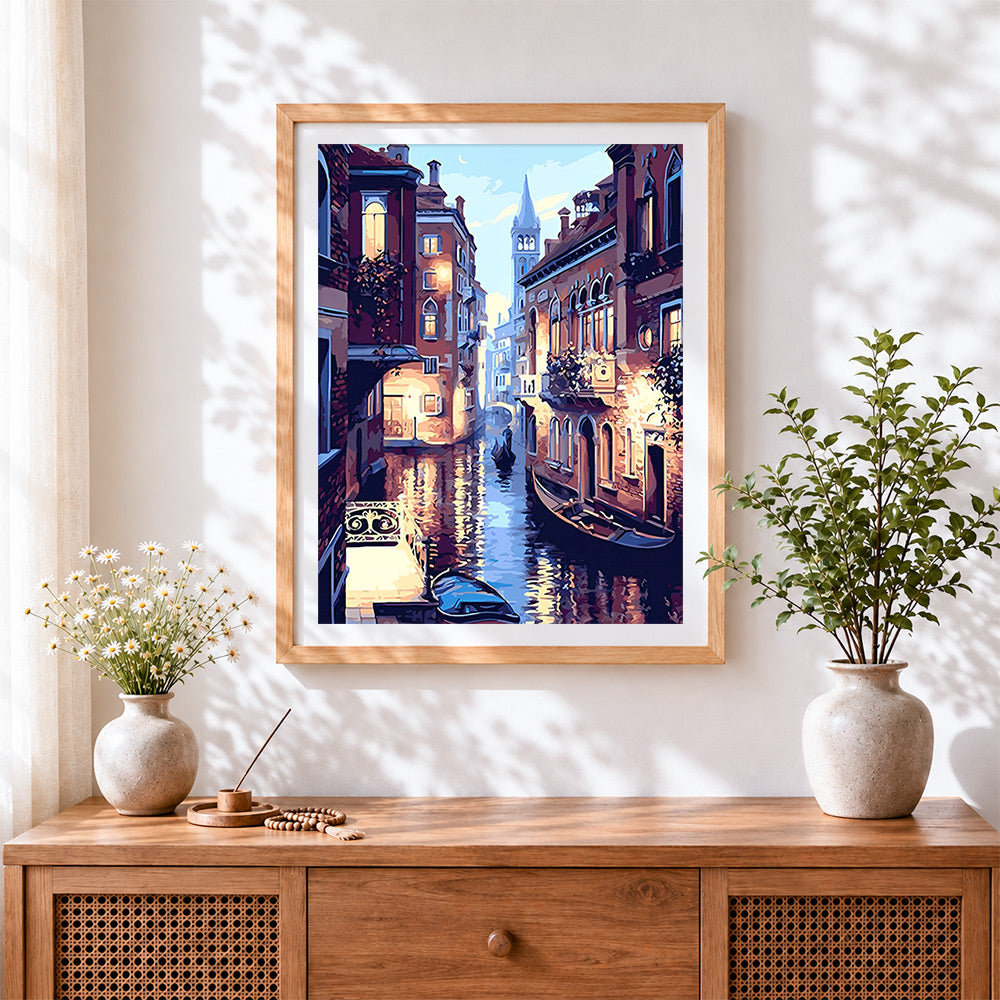 Finished venice canal at dusk with gondola cross stitch artwork displayed
