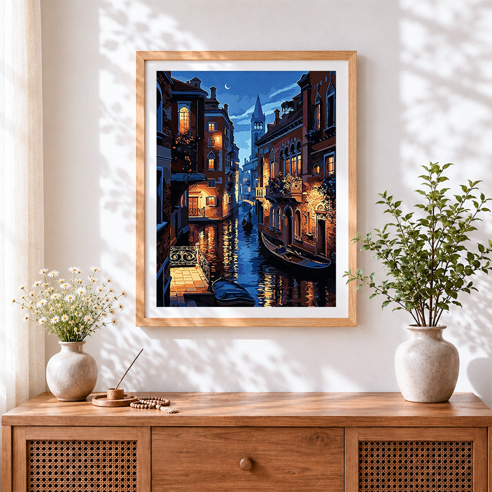 Finished venice canal at night with gondola cross stitch artwork displayed