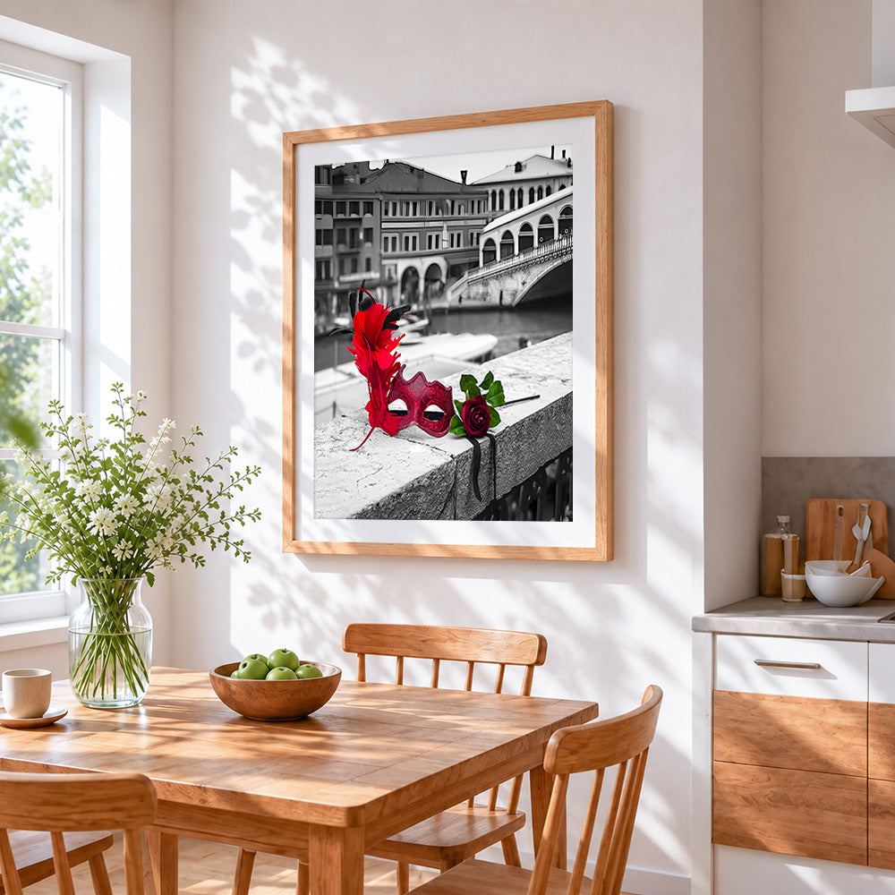 Venice mask and red rose cross stitch artwork displayed on wall as home decor
