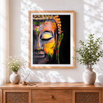 Finished vibrant abstract buddha face cross stitch artwork displayed
