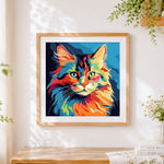 Finished vibrant abstract pop art cat cross stitch artwork displayed