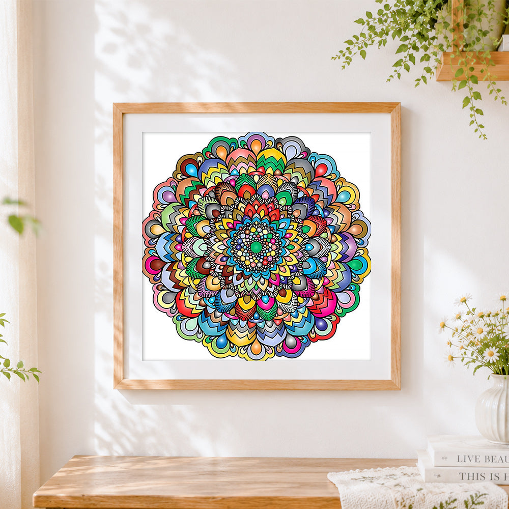 Finished vibrant and bold mandala cross stitch artwork displayed